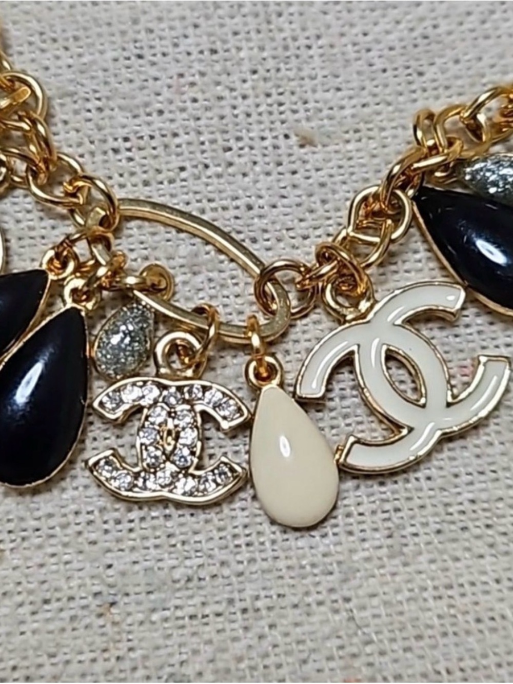 Chanel Gold Charm Bracelet with Black and Cream Teardrop Charms